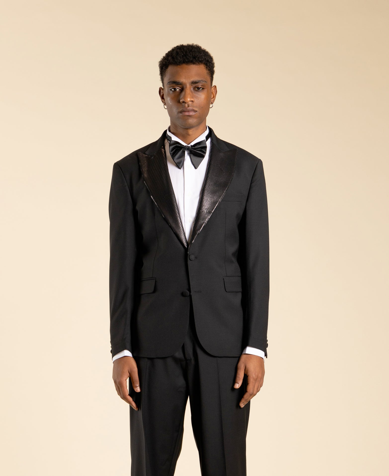 Veste à simple boutonnage avec revers à paillettes