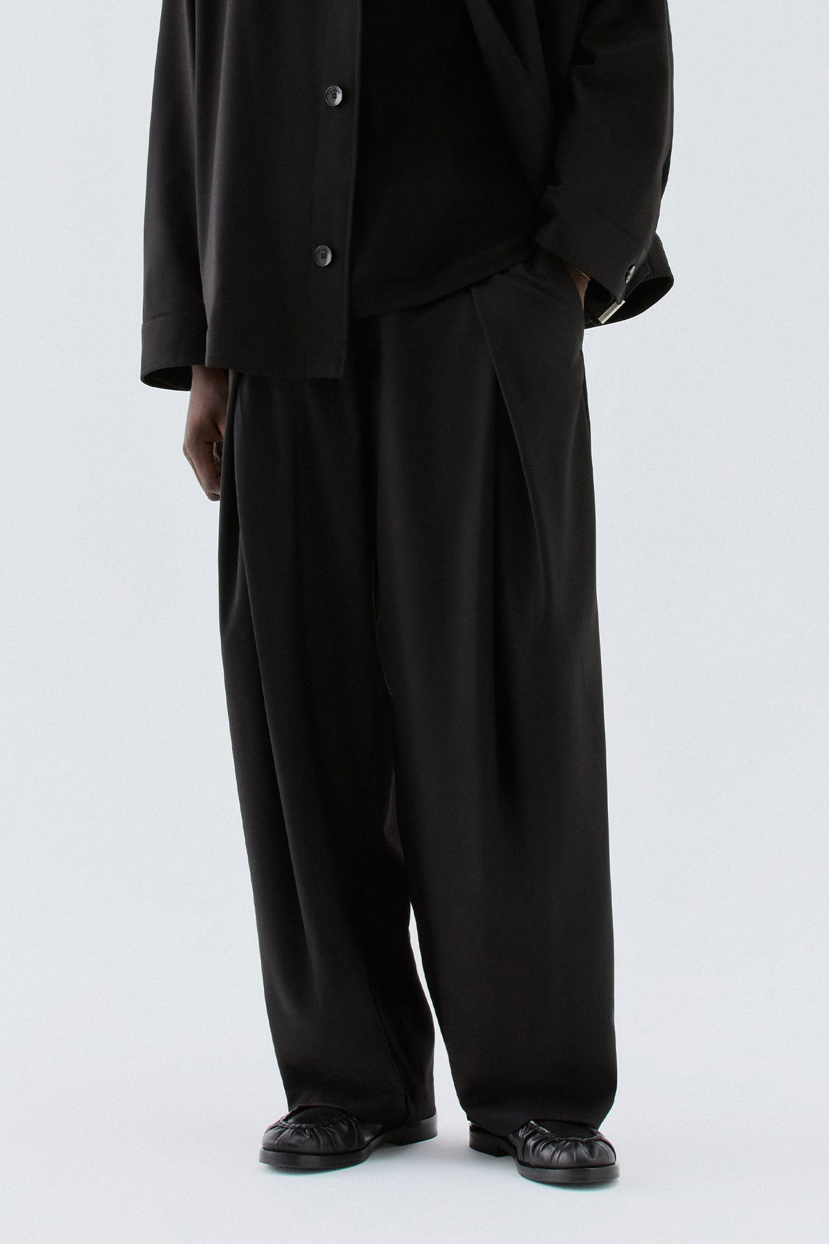 Pantaloni larghi con pinces avanti - Nero