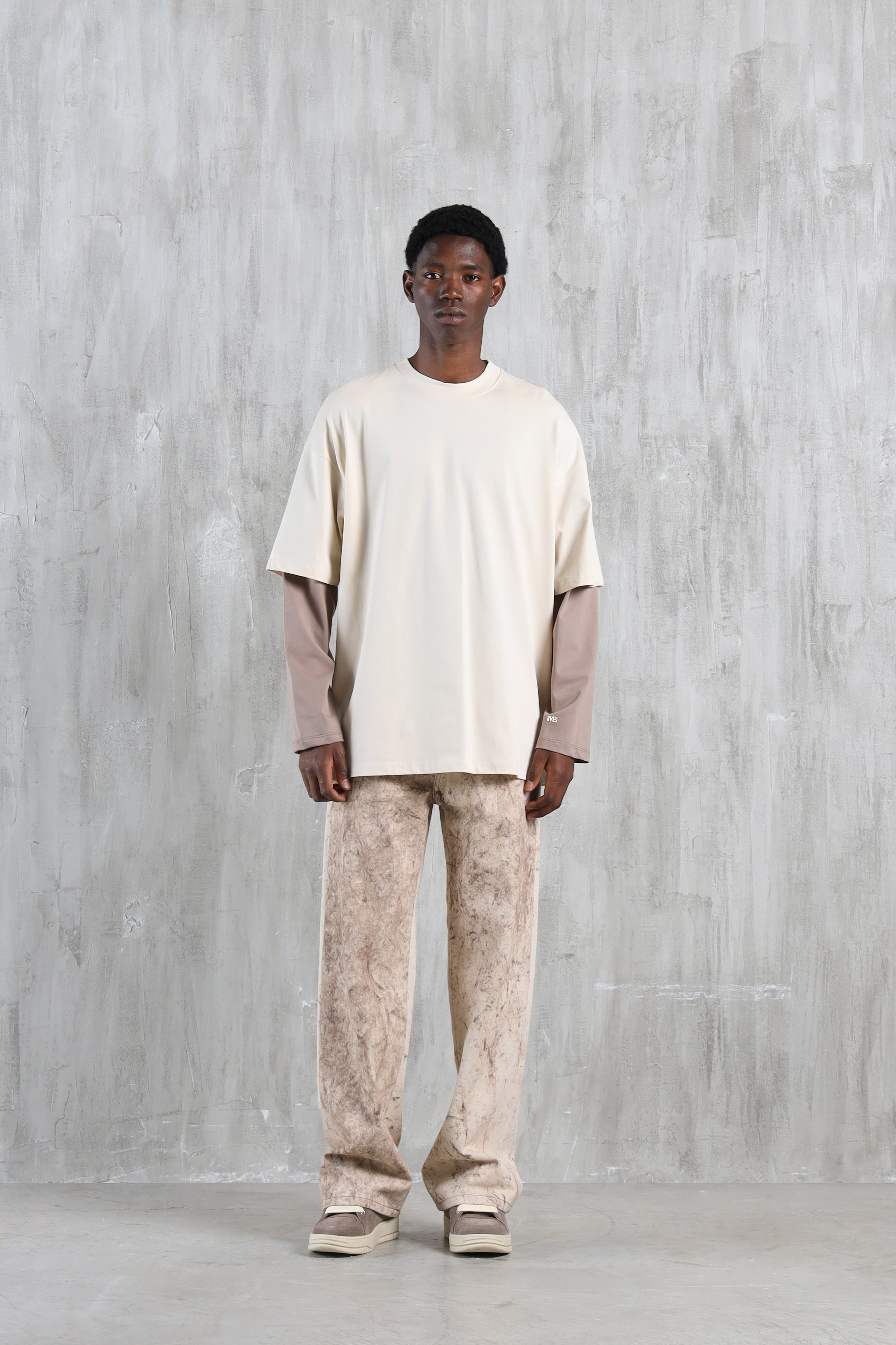 Jeans gamba ampia effetto stucco