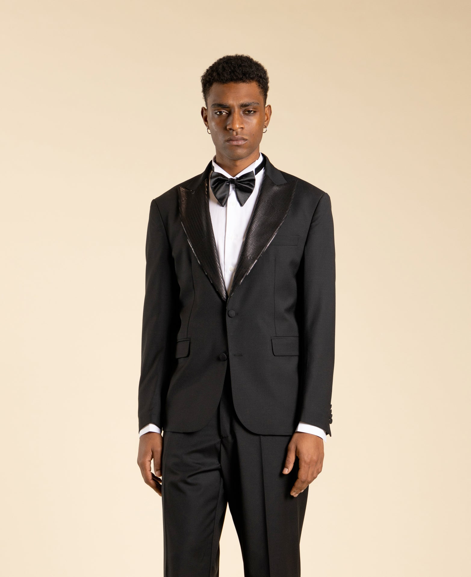 Veste à simple boutonnage avec revers à paillettes