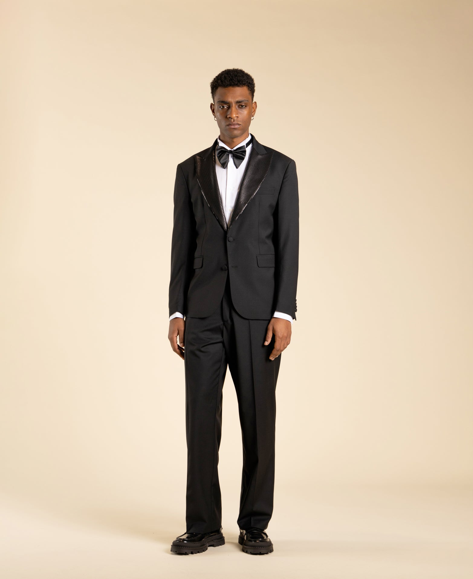 Veste à simple boutonnage avec revers à paillettes