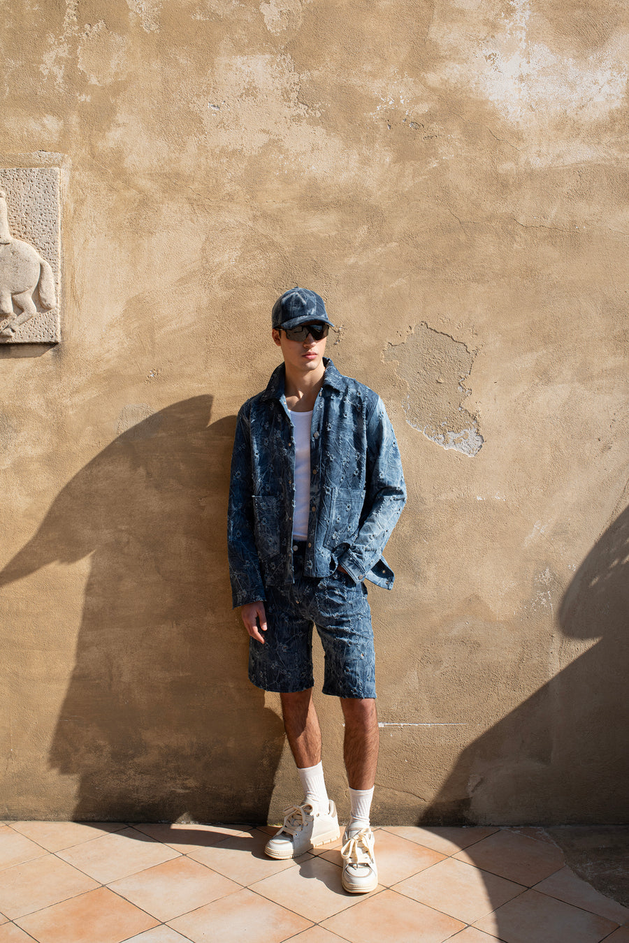 Bermuda in denim con rotture